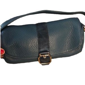 Cole Haan Teal genuine leather barrel bag carried a few time’s looks new